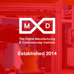 MxD logo superimposed over a photo of the MxD factory floor with a red overlay